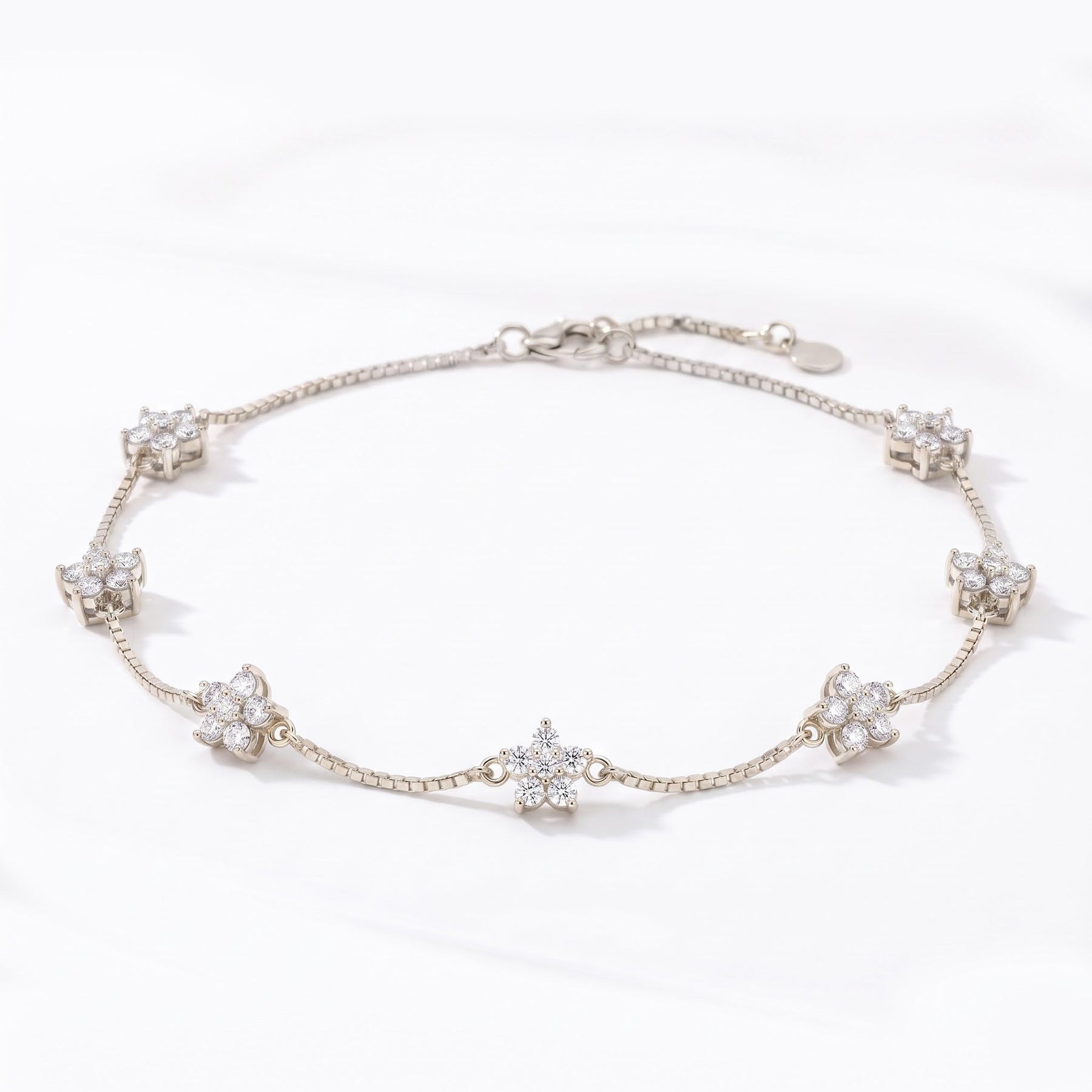 Floral diamond-cluster anklet with fine articulated chain