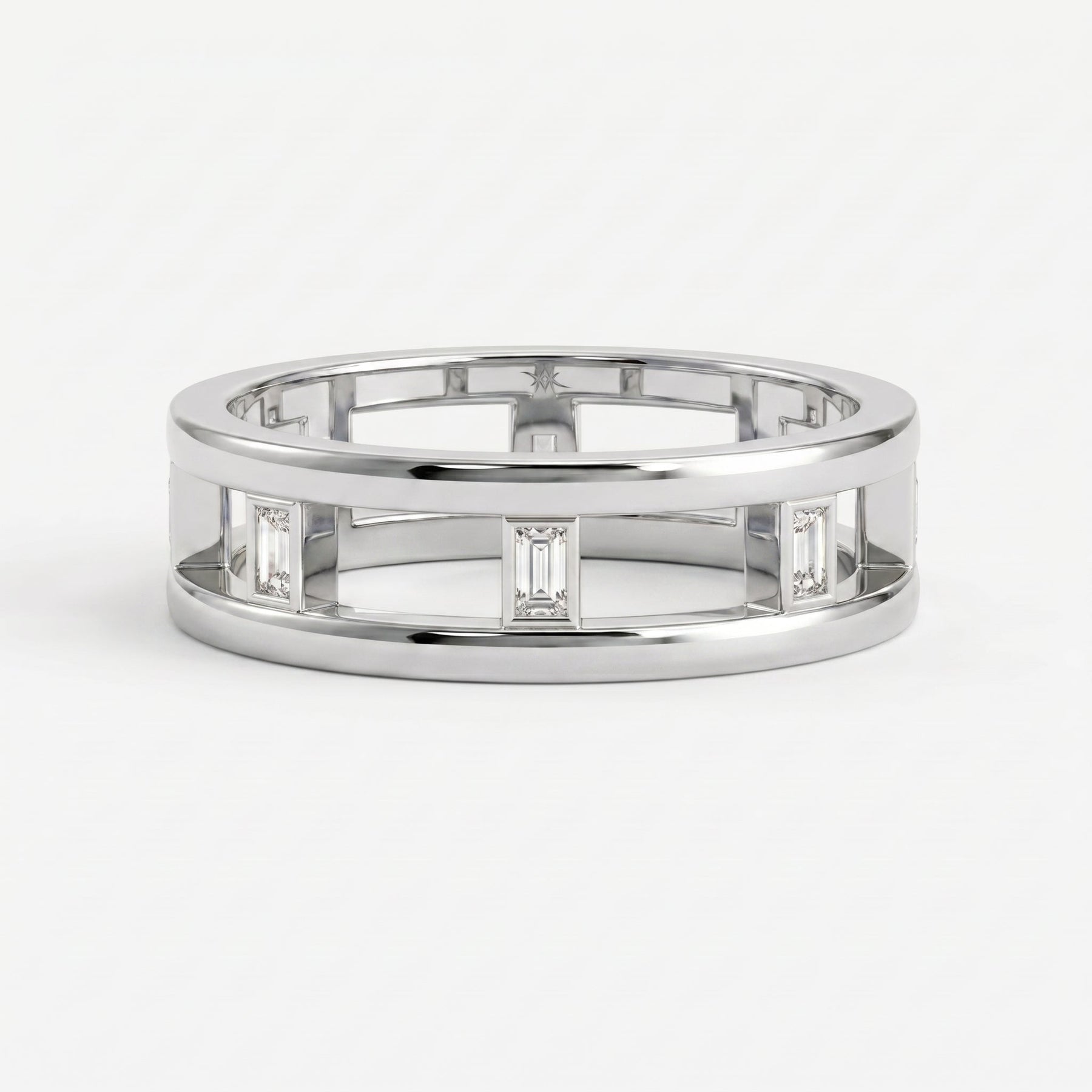 Close-up of Baguette diamond setting with polished metal detailing and fine jewelry craftsmanship