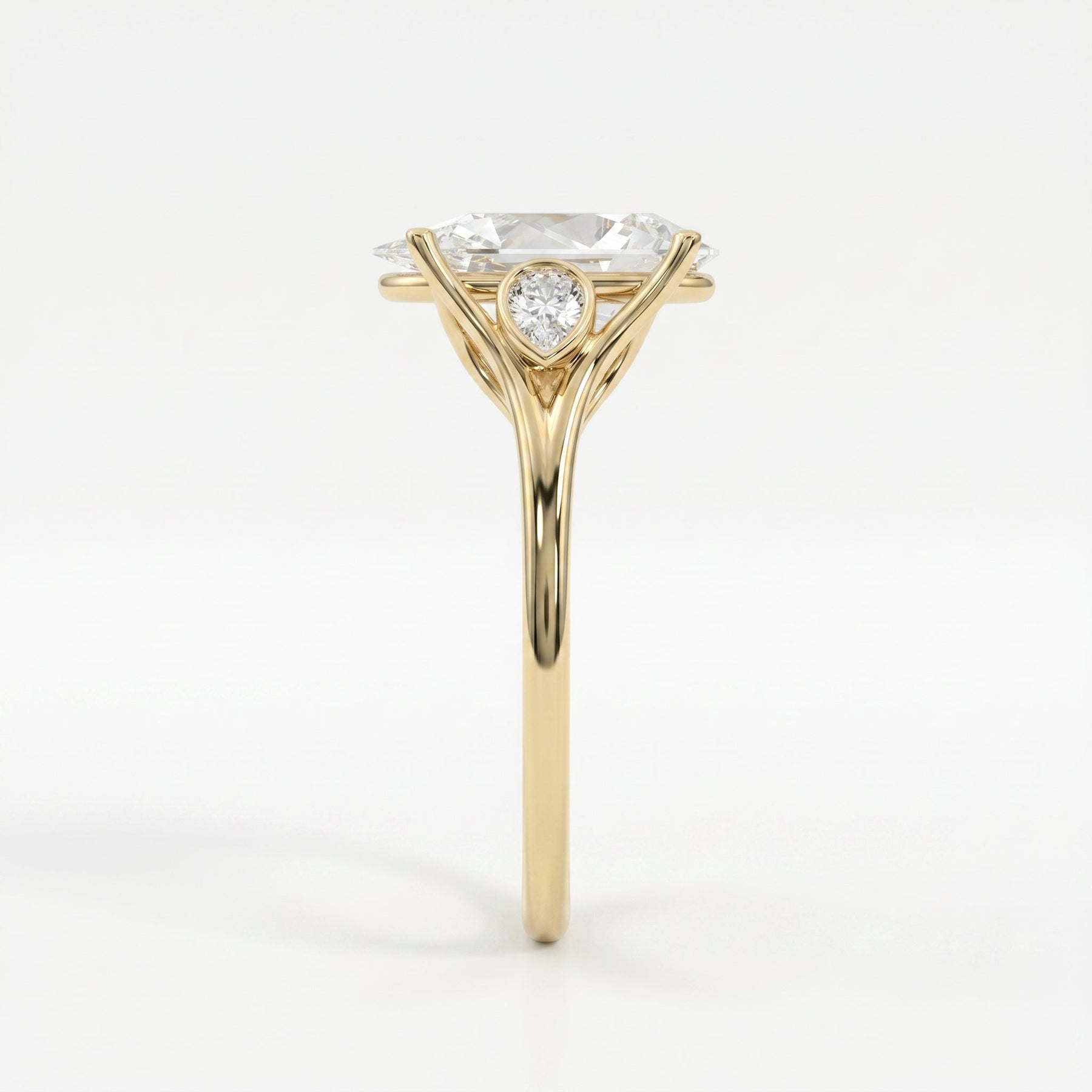 Custom 4‑Prong Diamond Ring with Bezel‑Set Pear Side Stones