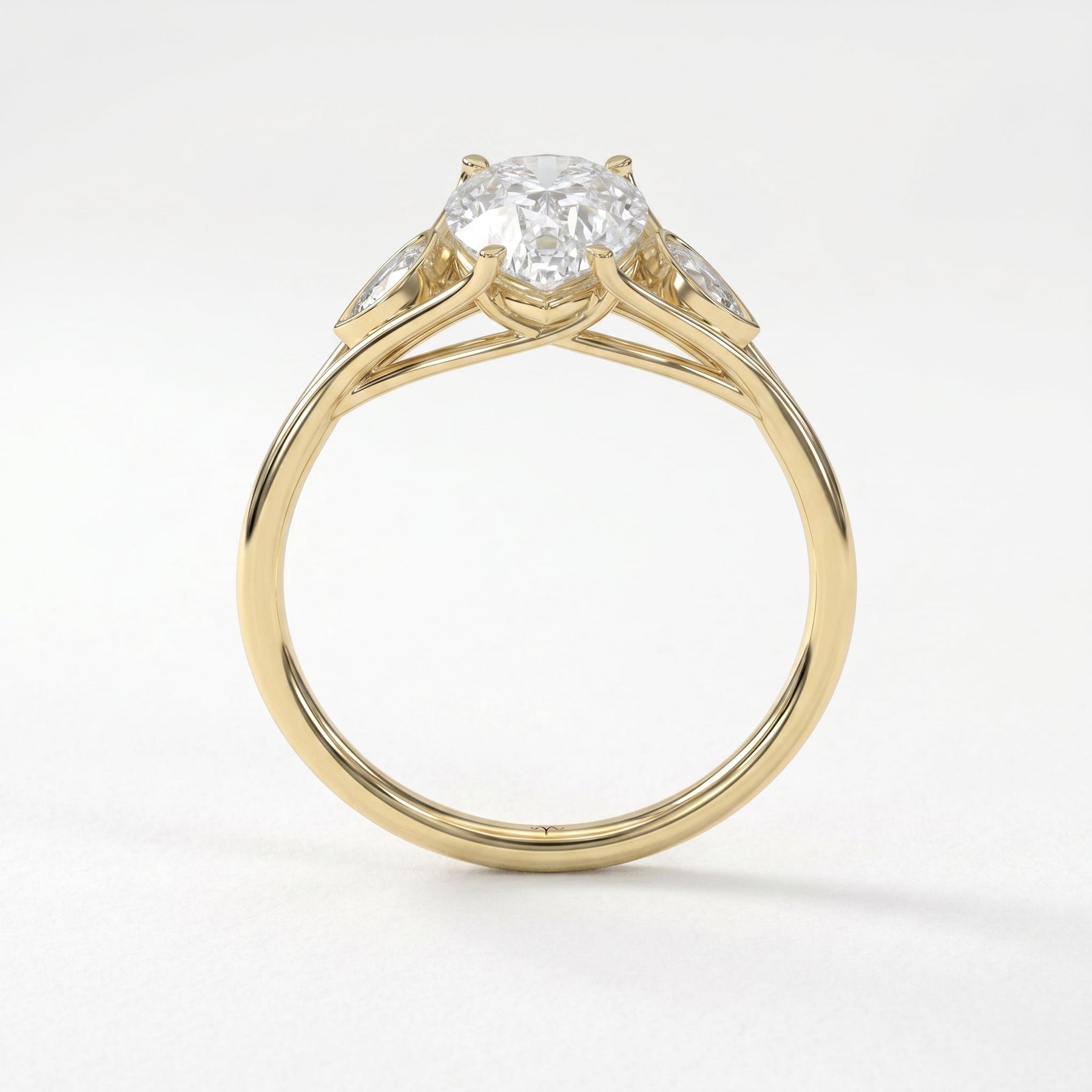 Custom 4‑Prong Diamond Ring with Bezel‑Set Pear Side Stones