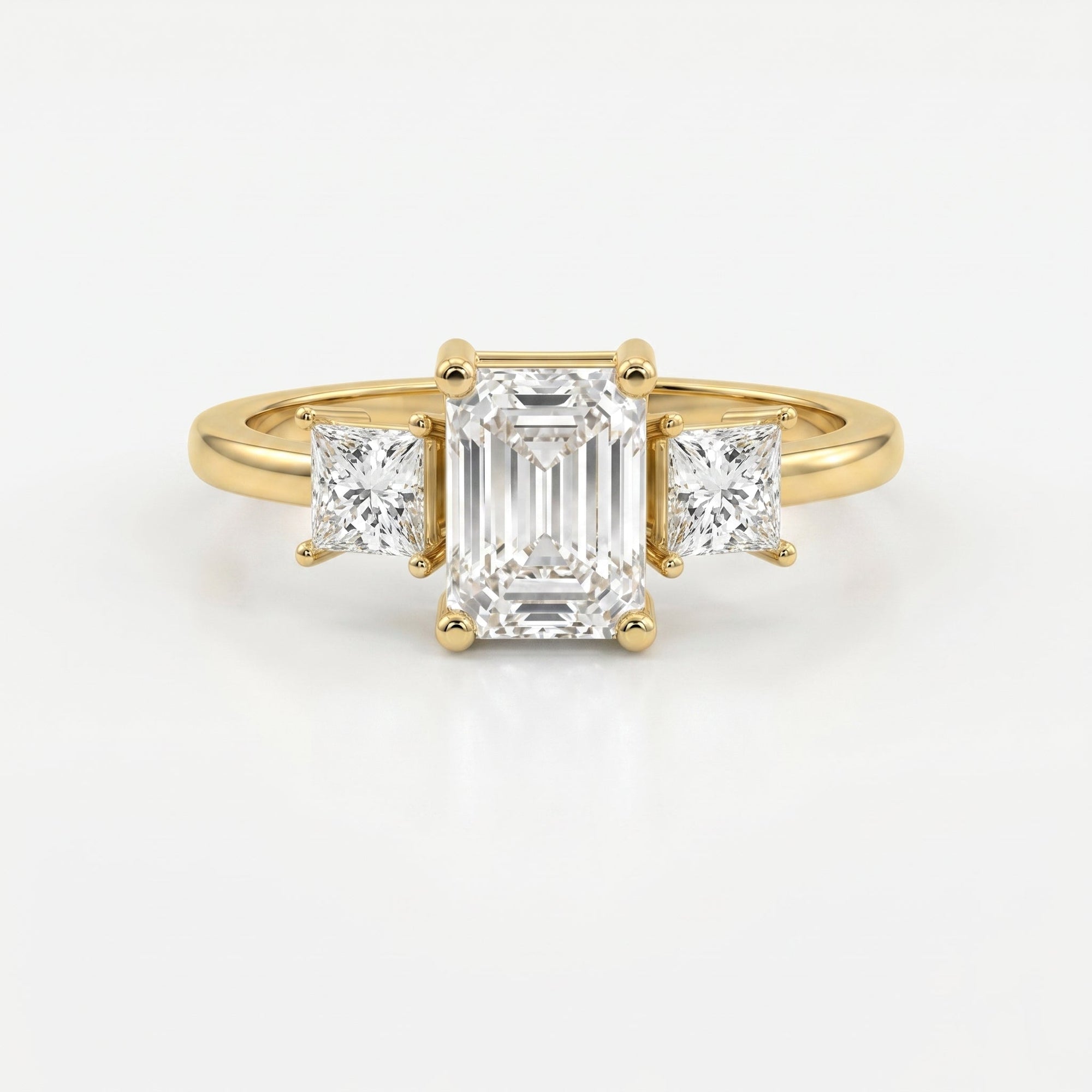 The Axis Trio Emerald Ring
