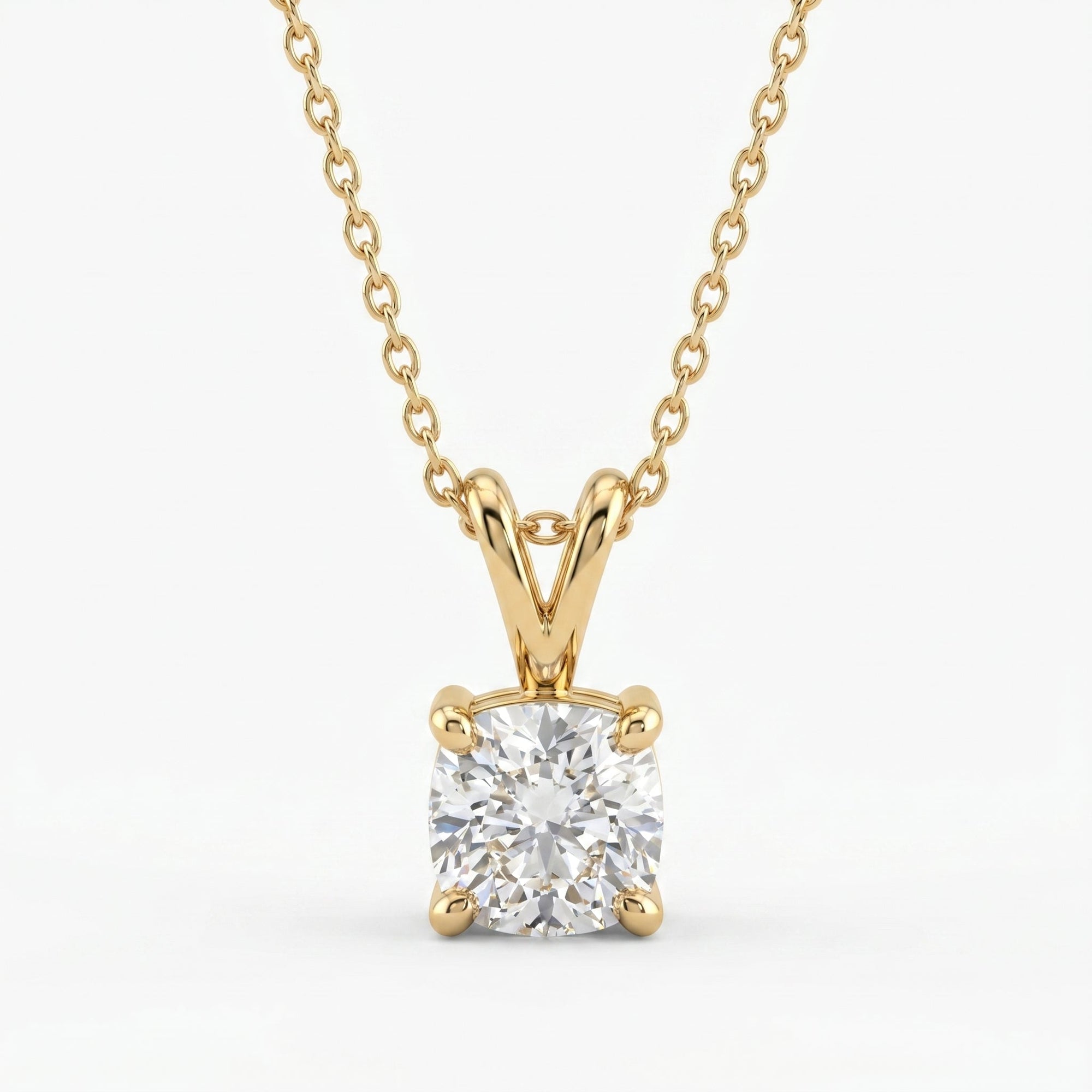 Luxury yellow gold cushion cut solitaire pendant necklace with brilliant clear gemstone on white background
