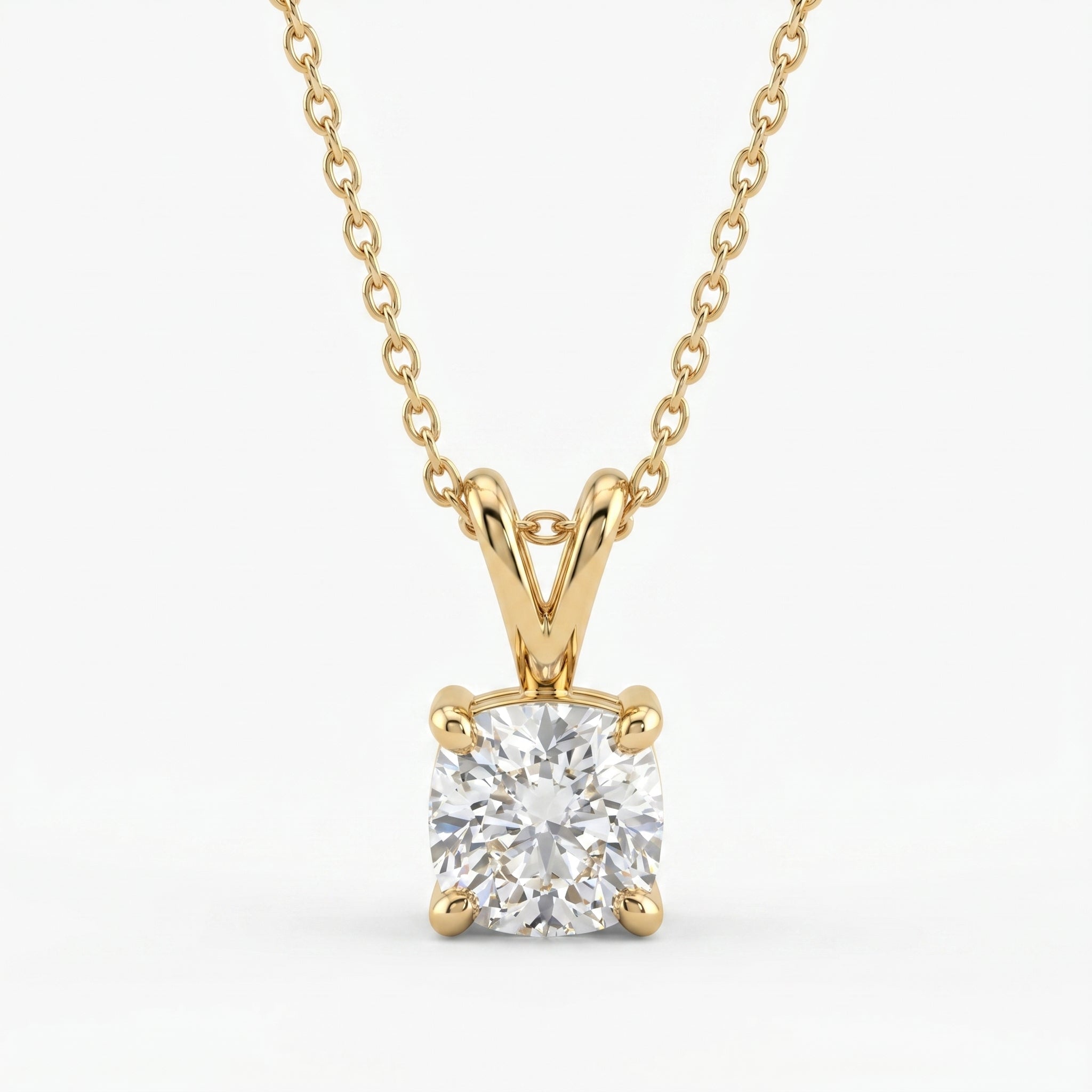 Luxury yellow gold cushion cut solitaire pendant necklace with brilliant clear gemstone on white background