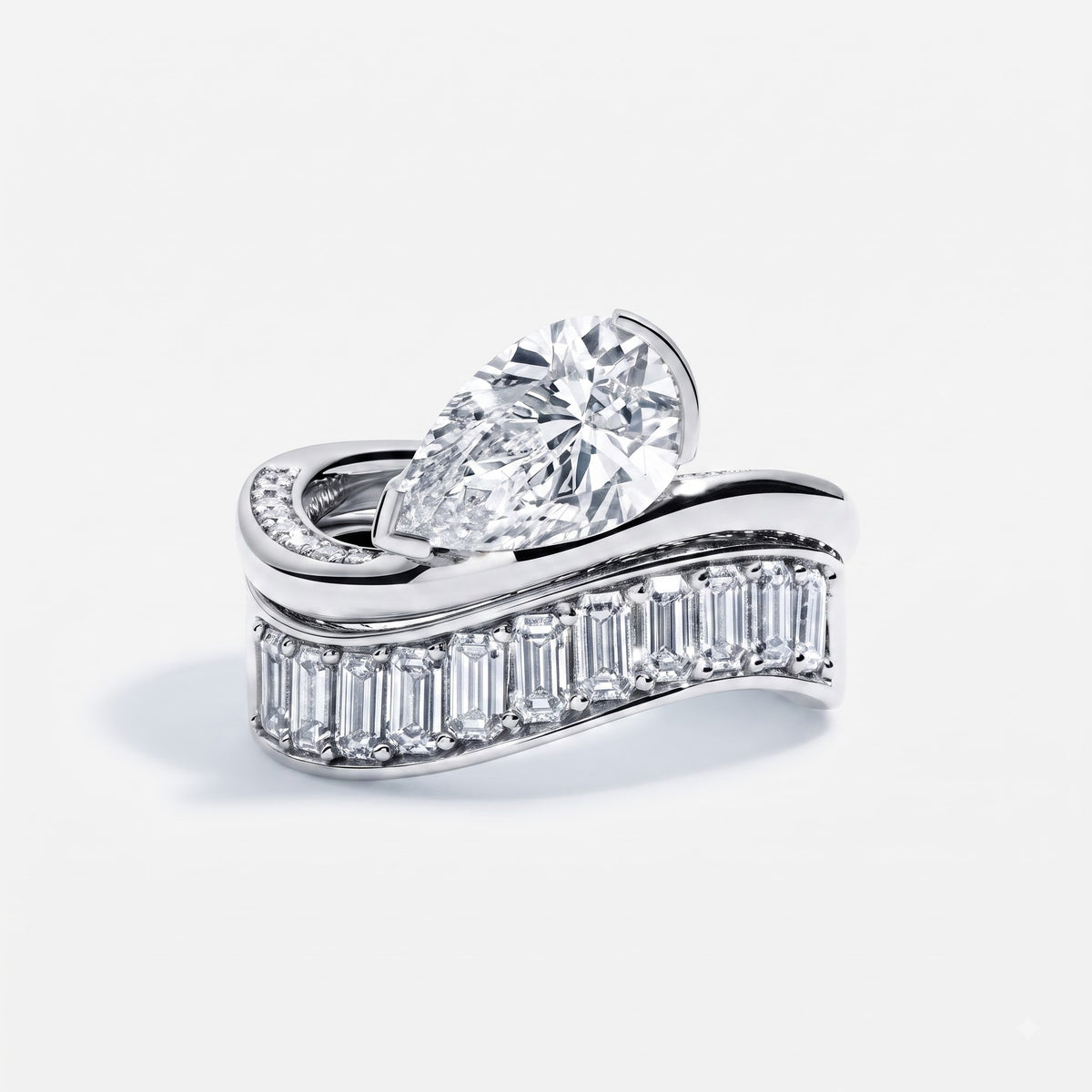 Bold brilliance meets architectural elegance , Pear Cut & Baguette Diamond Ring