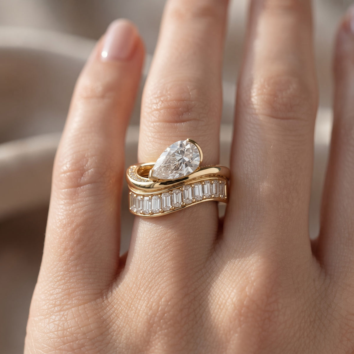 Bold brilliance meets architectural elegance , Pear Cut & Baguette Diamond Ring