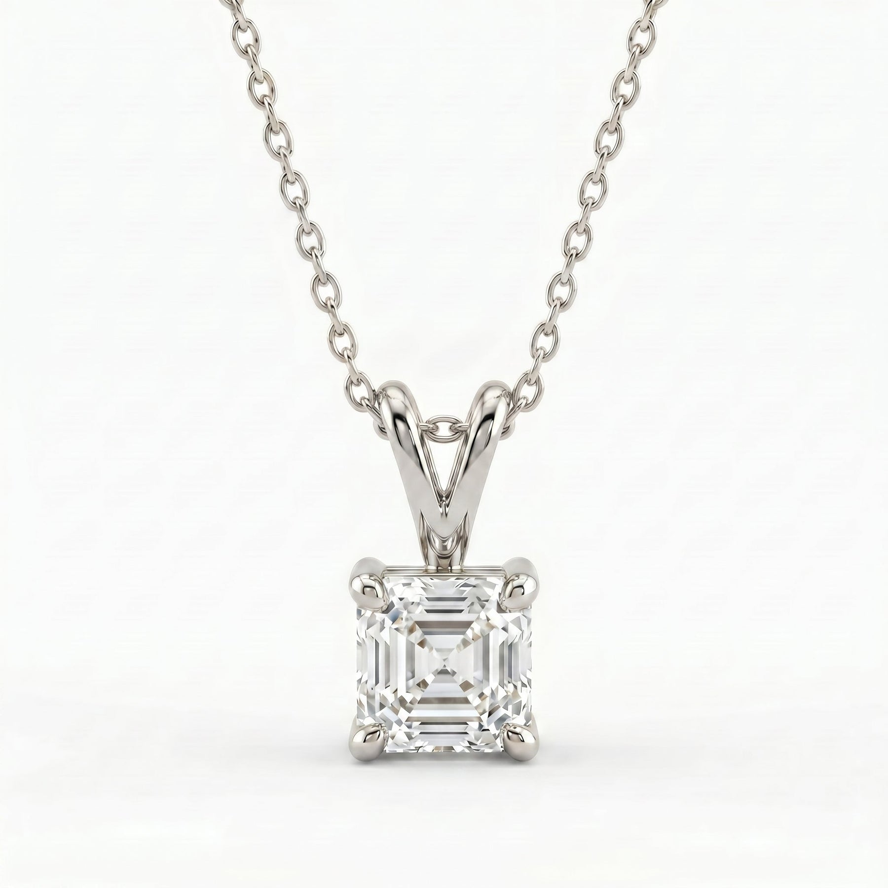 Diamond pendant necklace on a white background