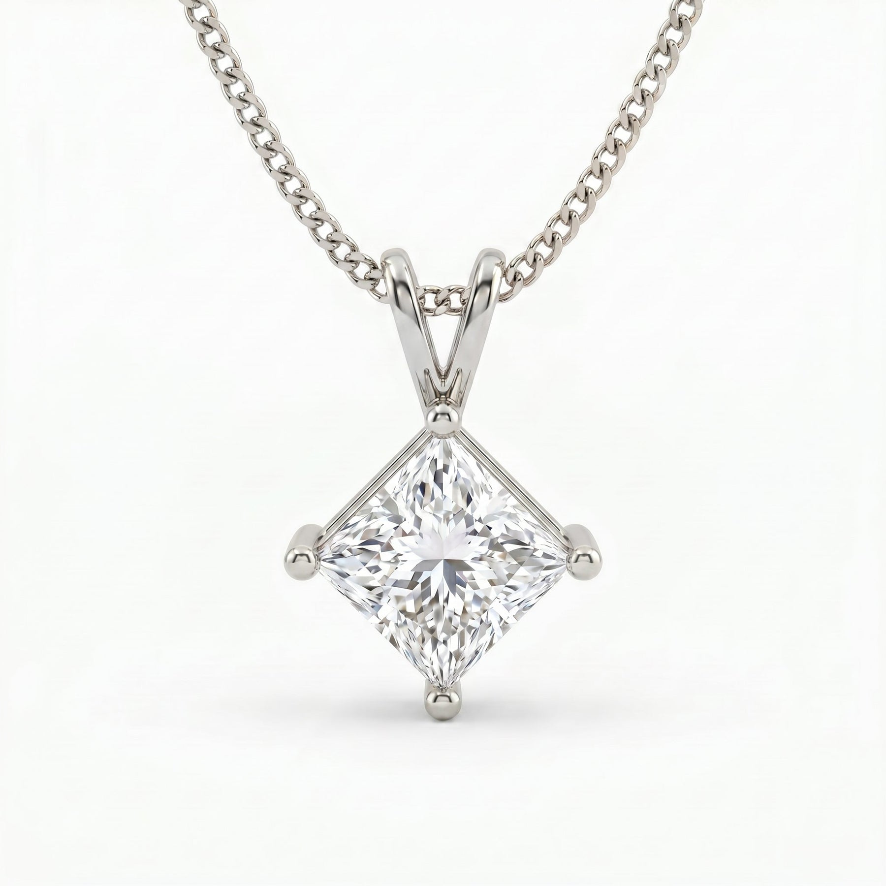 Diamond pendant necklace on a white background