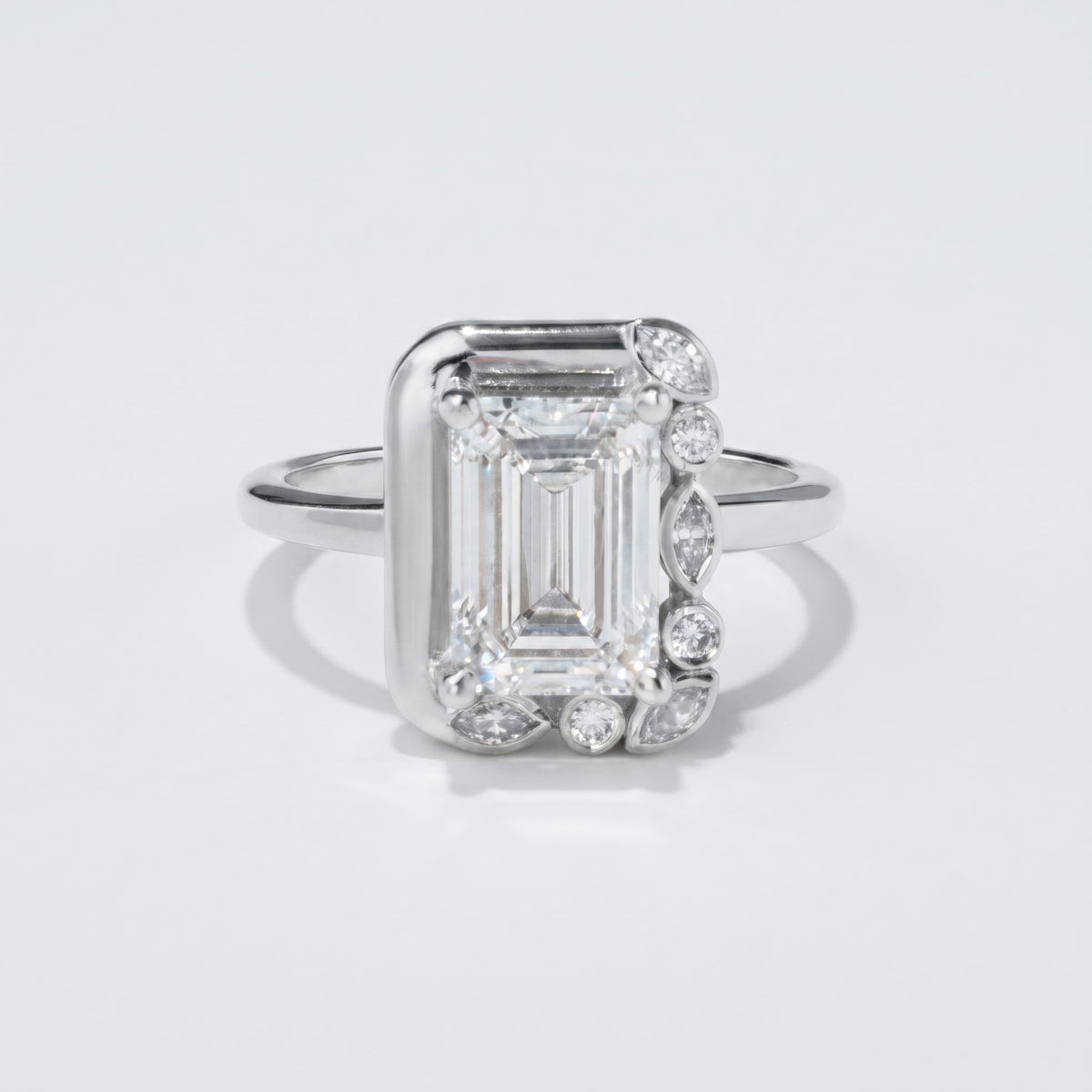 Emerald Cut Cluster Ring & Marquise Diamond Botanical Ring
