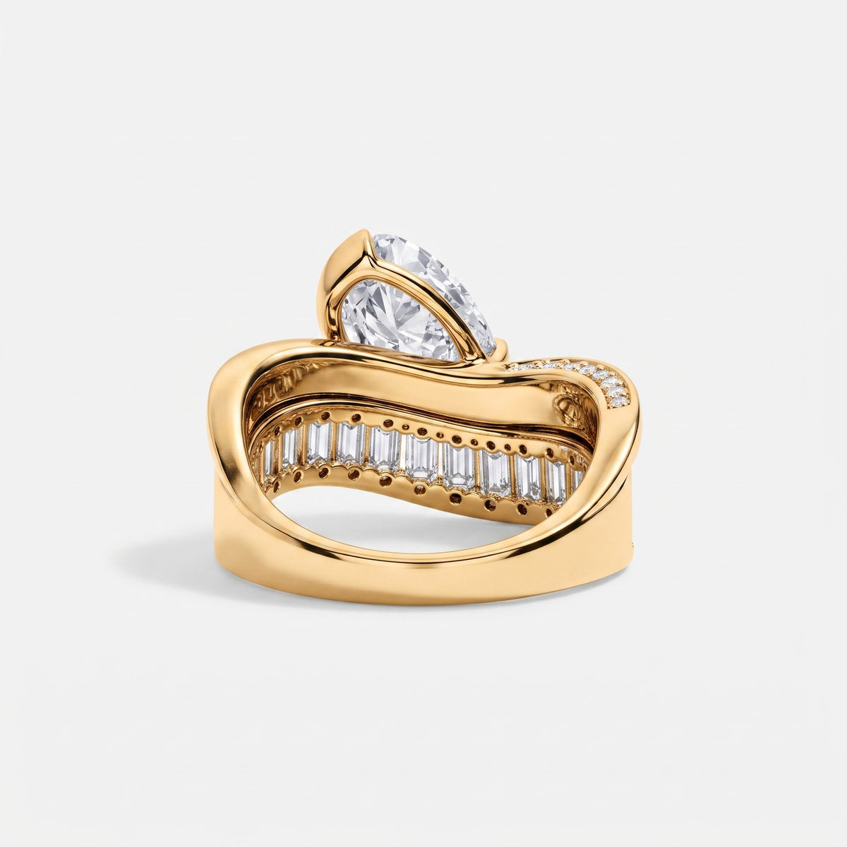 Bold brilliance meets architectural elegance , Pear Cut & Baguette Diamond Ring