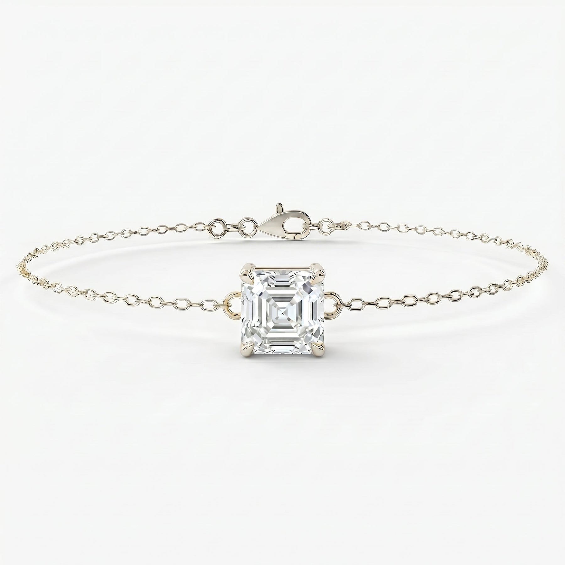 Elegant asscher cut diamond bracelet in fine gold chain shown at luxury angled studio perspective