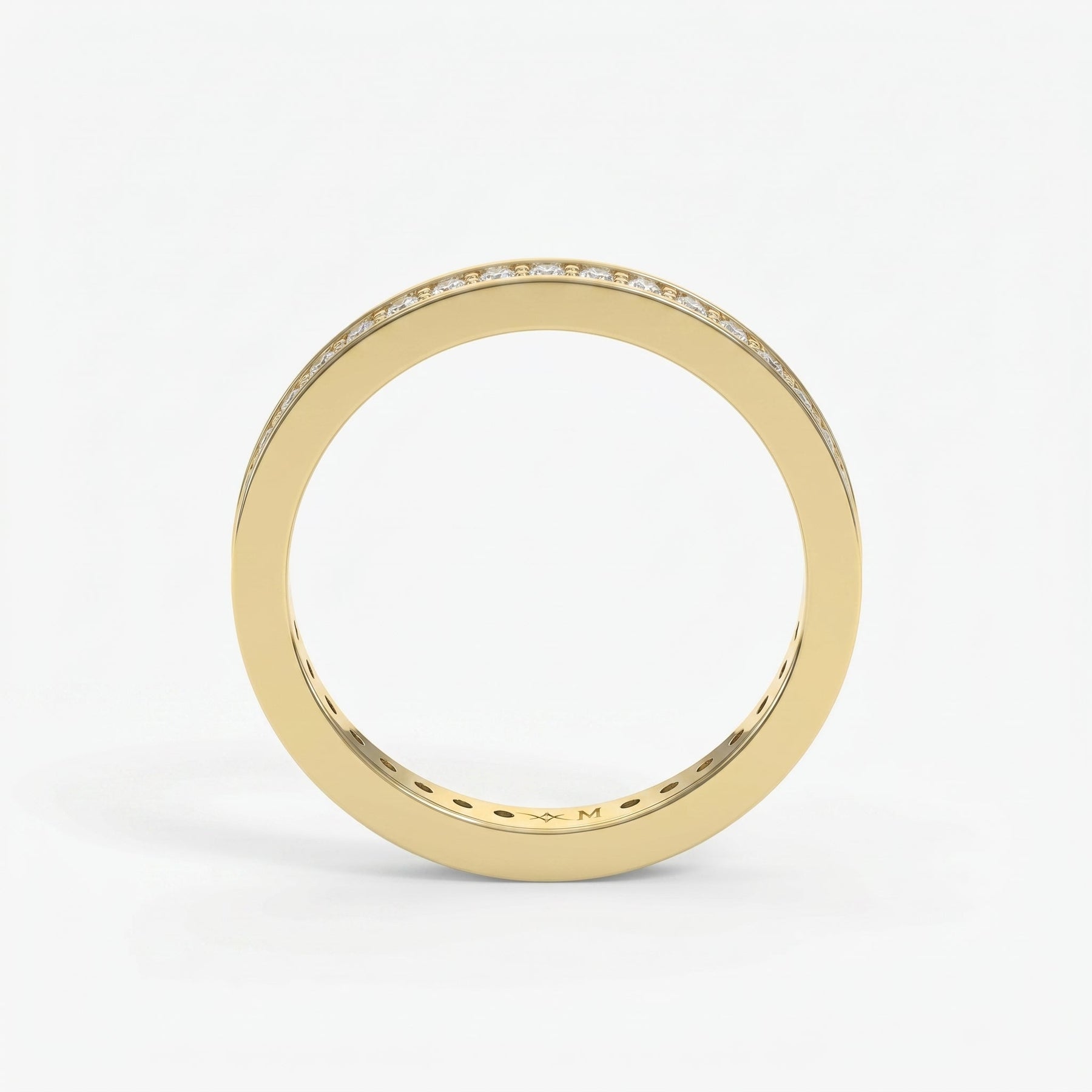 Yellow gold diamond eternity band with channel-set round diamonds, luxury wedding ring with polished finish
