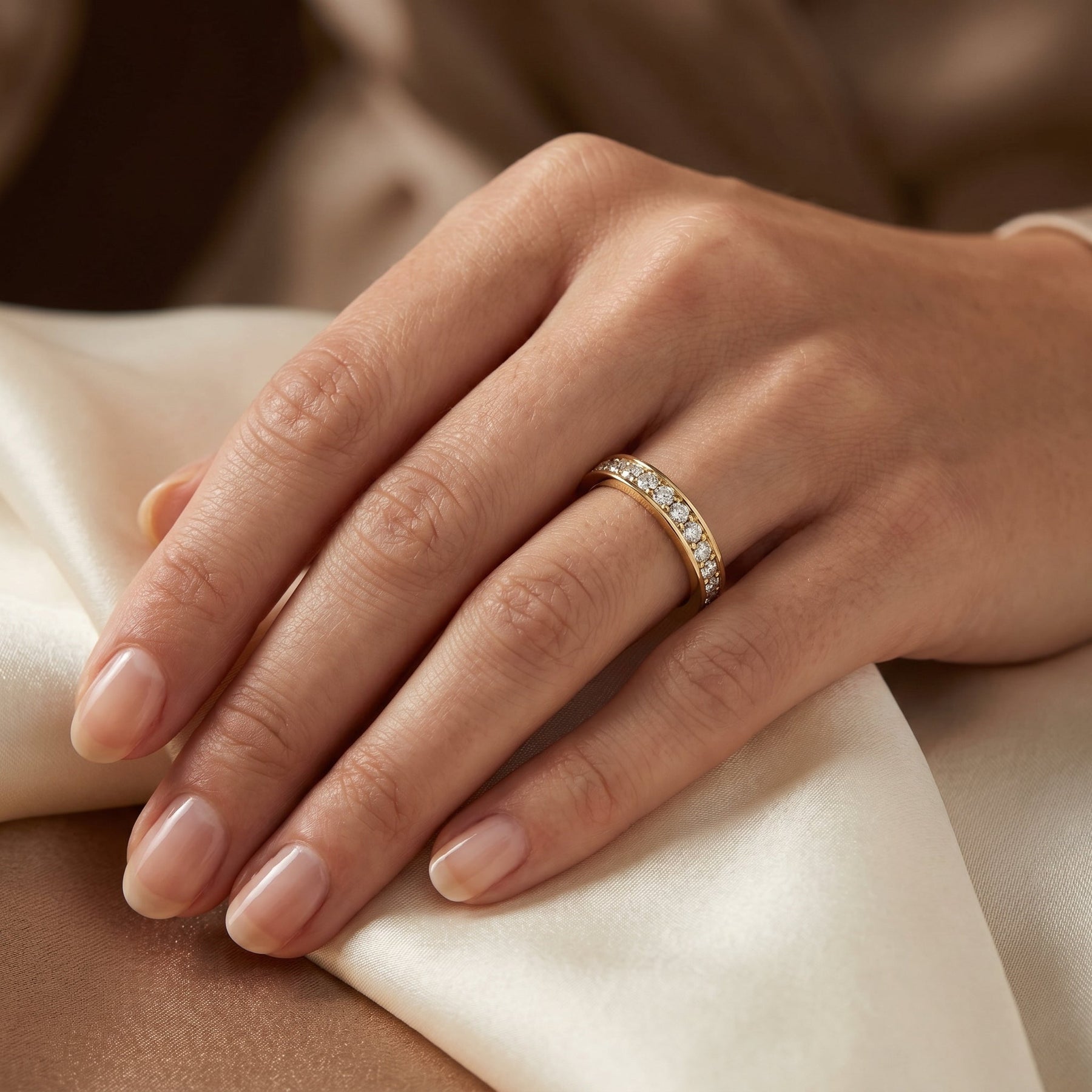 Yellow gold diamond eternity band ring with brilliant round diamonds, elegant stackable wedding band design