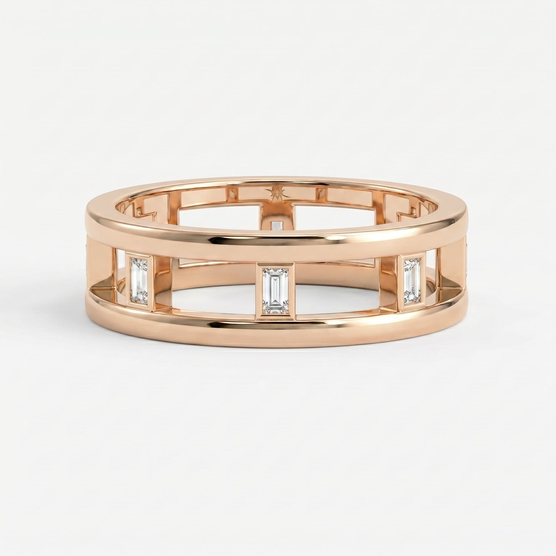 Top view of luxury openwork diamond band ring displaying geometric design and Baguette diamond placement