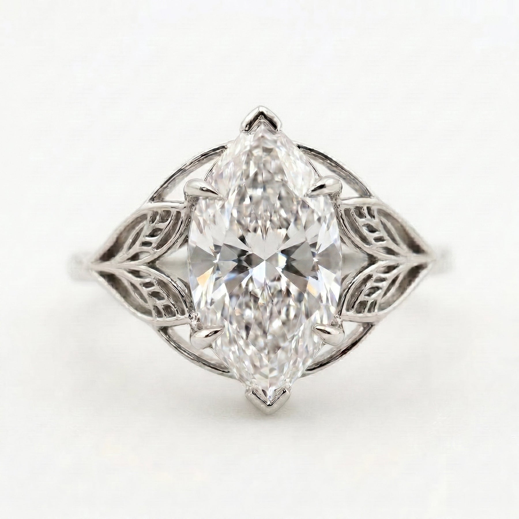 Solitaire Leaf Design Marquise Cut Diamond Engagement Ring