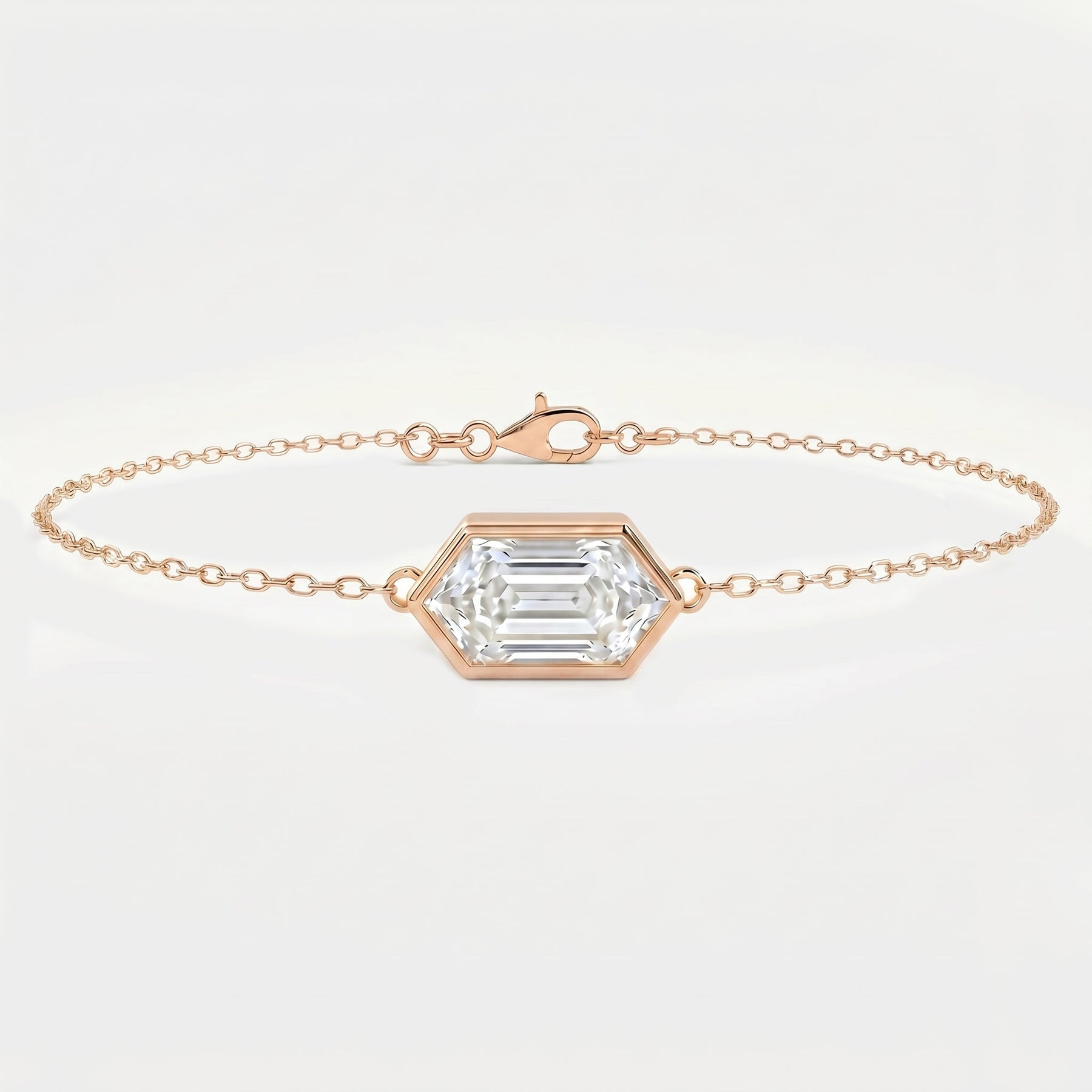 Minimalist hexagon diamond chain bracelet in Rose gold with bezel setting on clean white background
