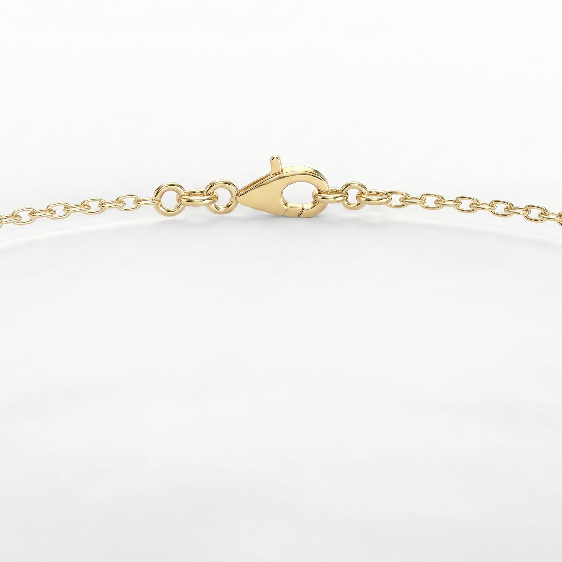 Close-up of hexagon crystal gemstone bracelet with polished gold bezel and luxury jewelry detailing
