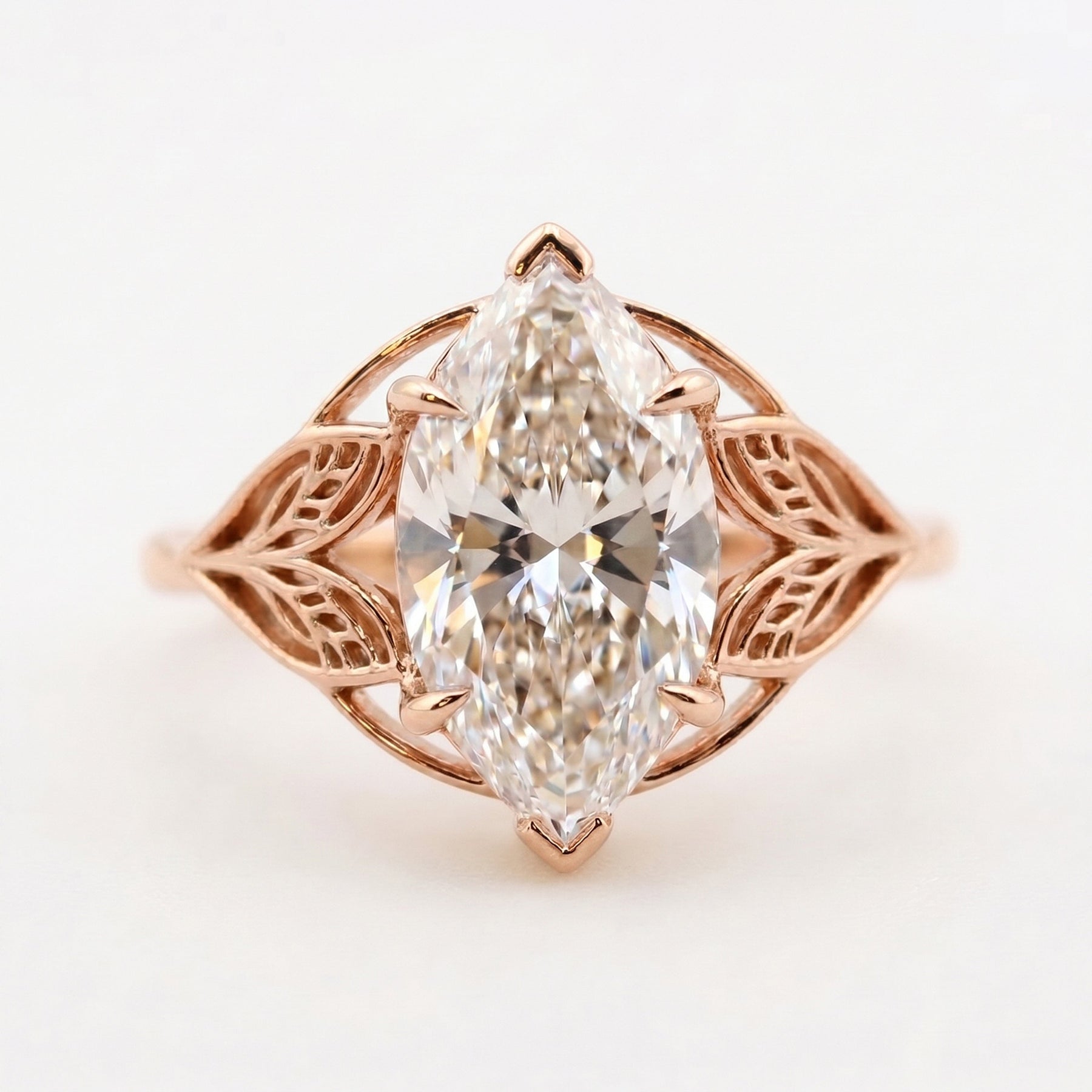 Solitaire Leaf Design Marquise Cut Diamond Engagement Ring