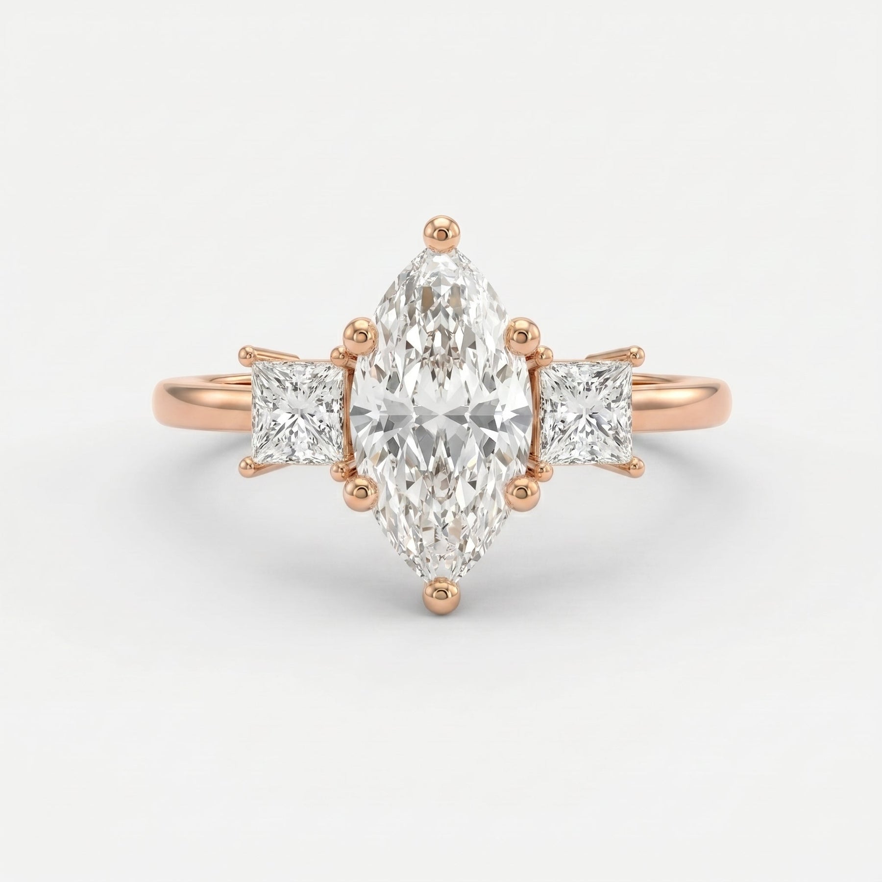 The Prism Three-Stone Marquise