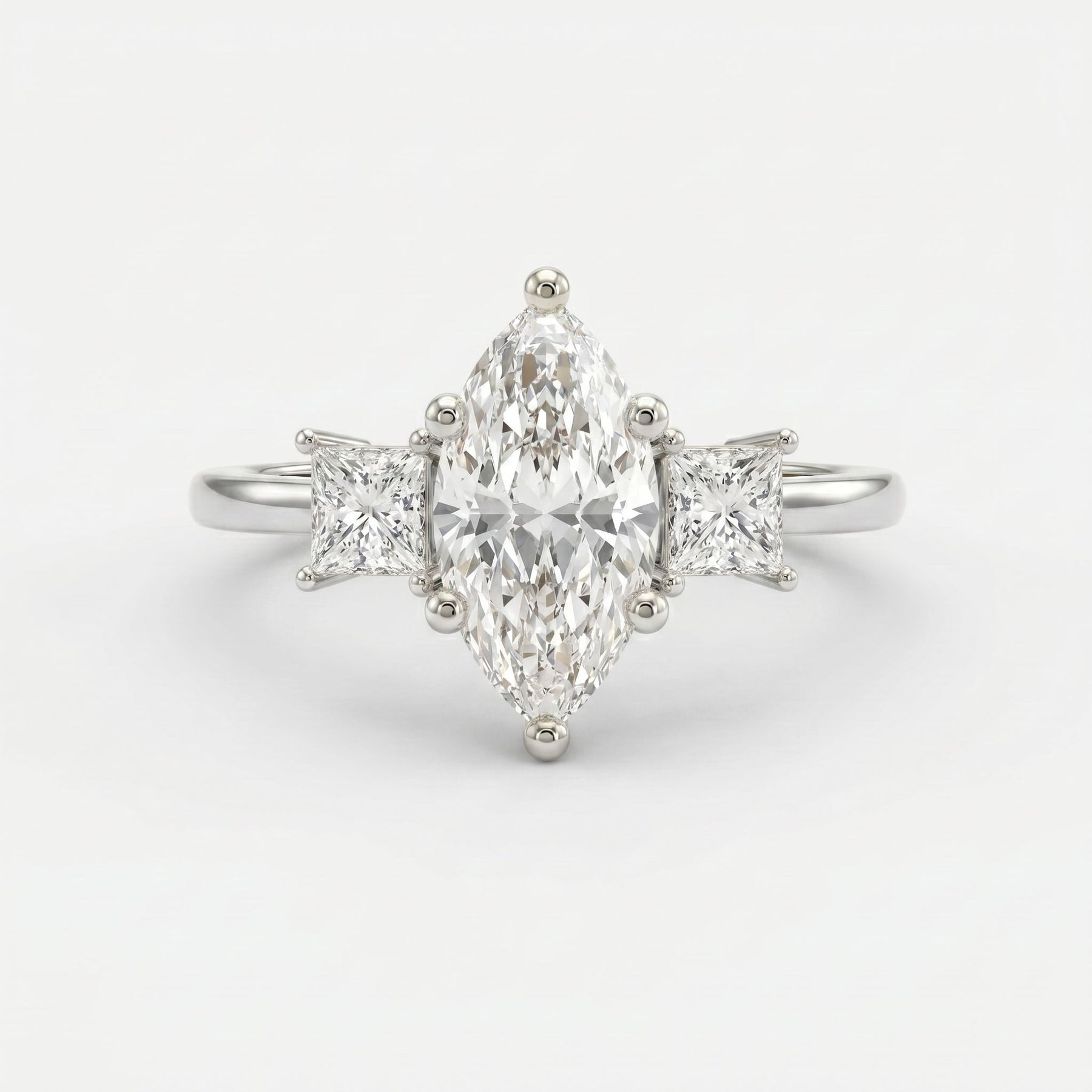The Prism Three-Stone Marquise