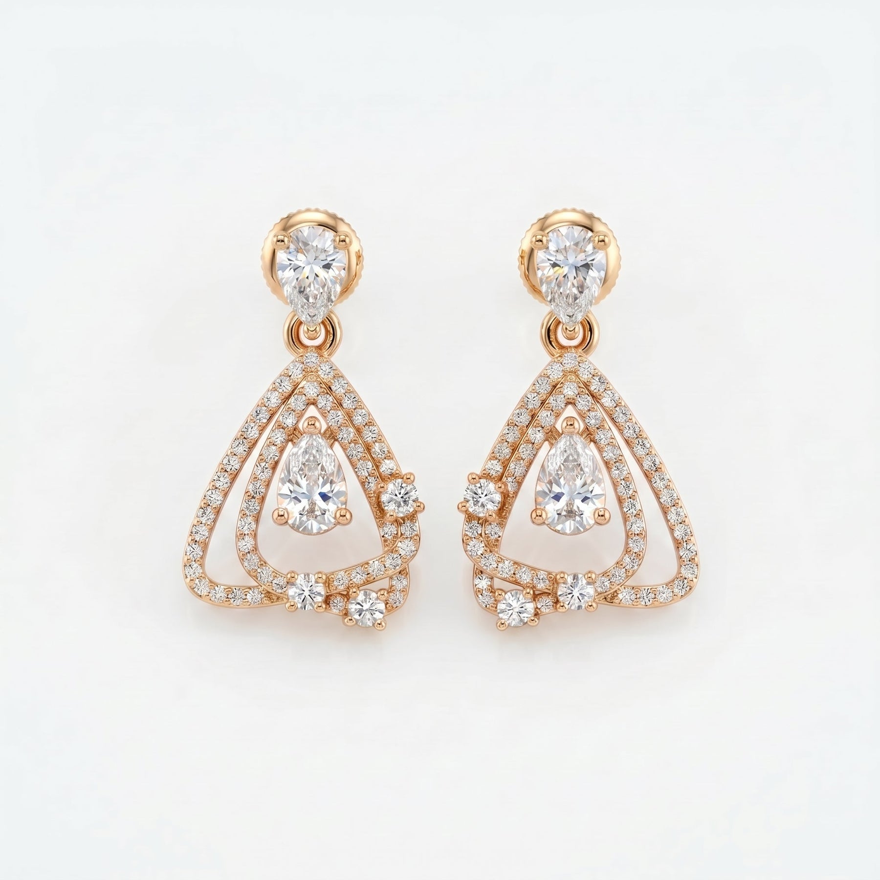 Rose gold pavé drop earrings with pear-cut stones and geometric open frame design on white background.