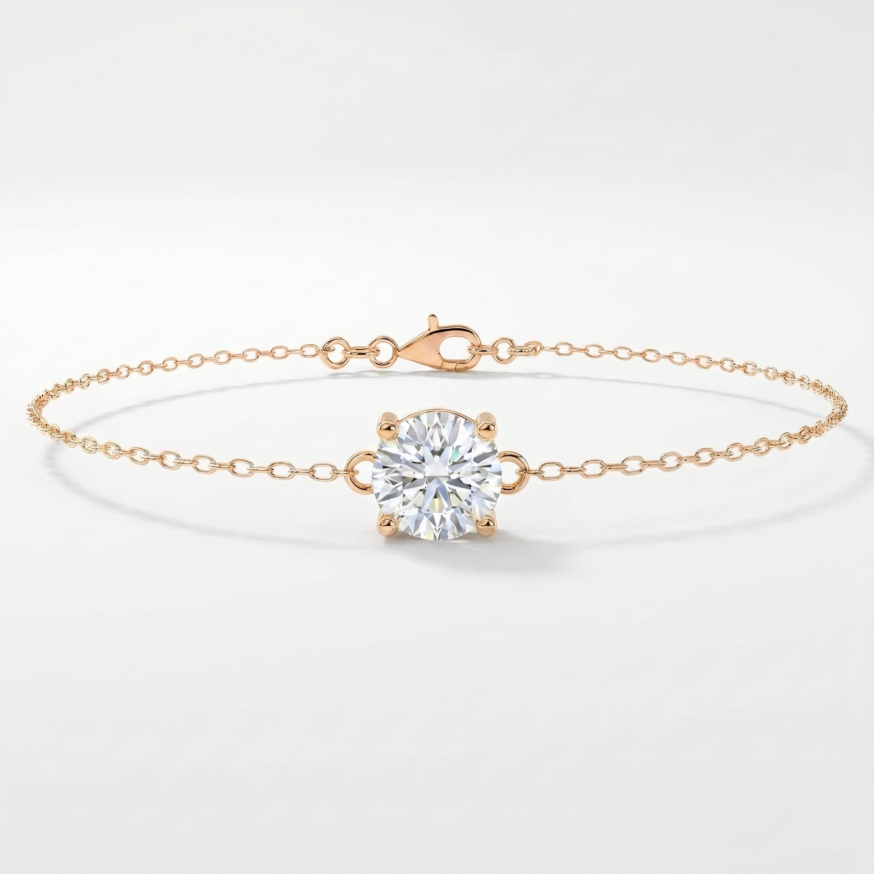 Minimalist rose gold solitaire bracelet with round brilliant gemstone on delicate fine chain