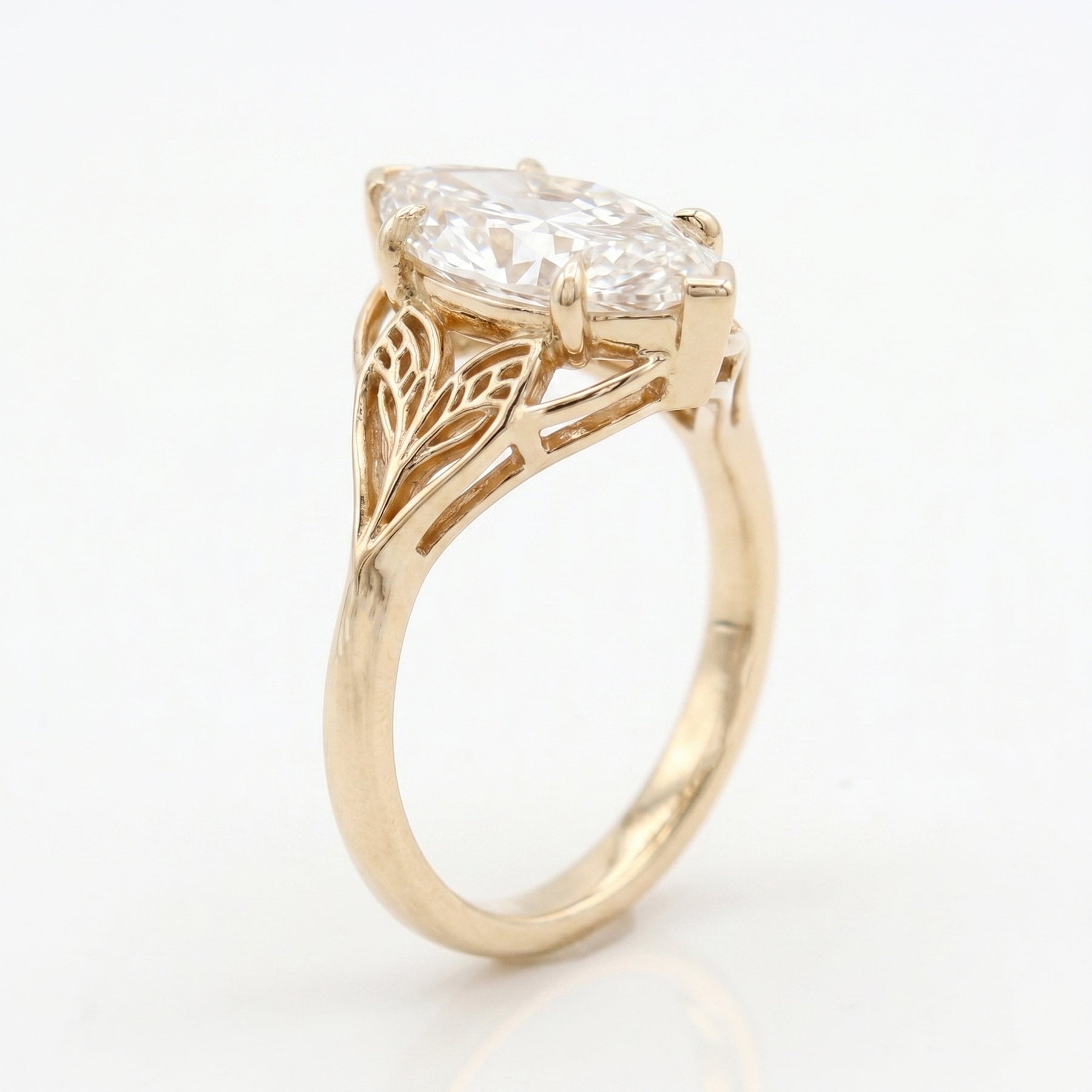 Solitaire Leaf Design Marquise Cut Diamond Engagement Ring