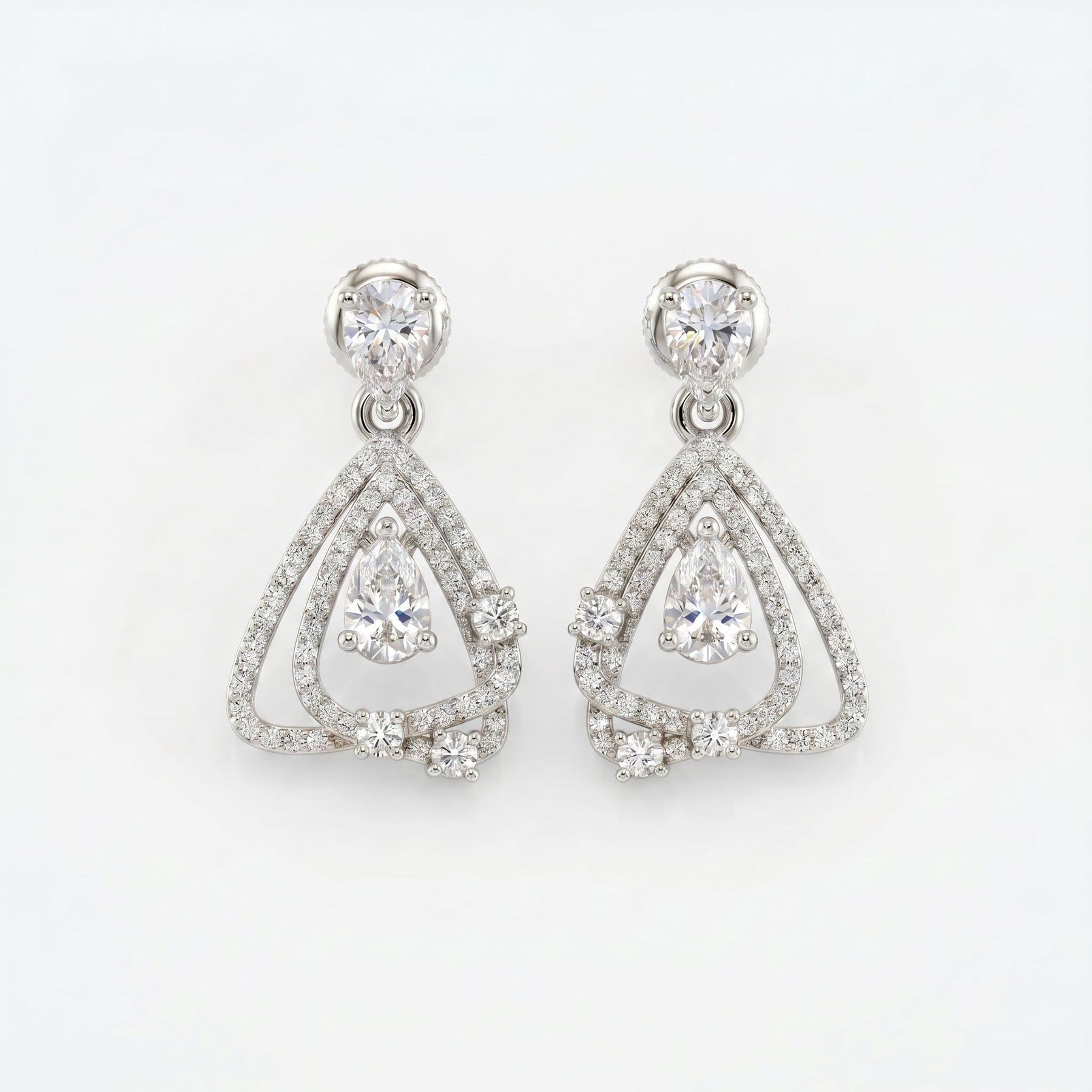 White gold pavé drop earrings with pear-cut stones and elegant geometric open frame design.