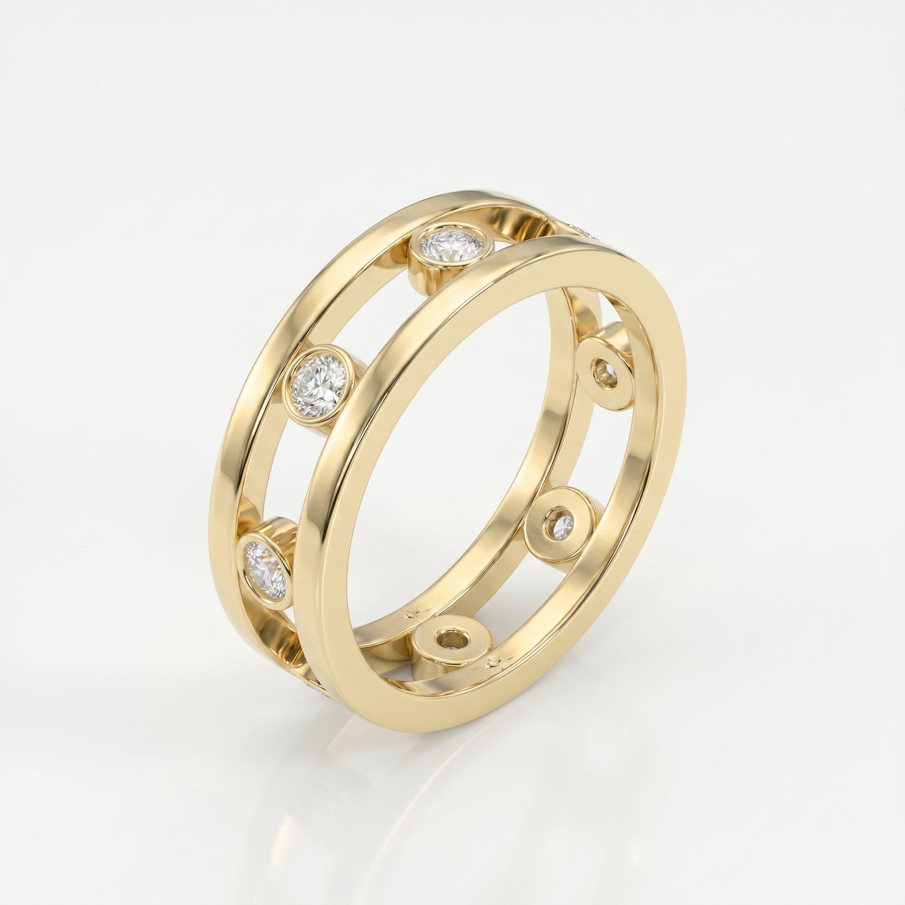 Yellow gold designer diamond ring with floating bezel-set stones shown at 45-degree angle on white background.